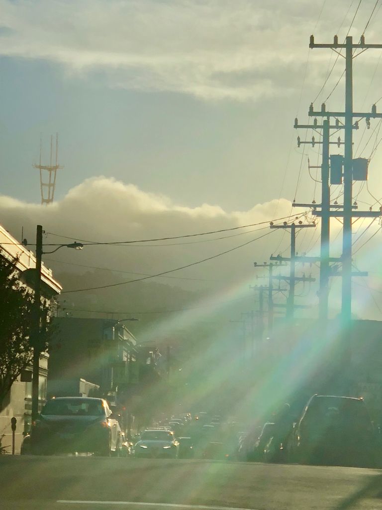 Westward on 19th around S Van Mess, evening, Sutrow Tower and Upper Market obscured by fog.