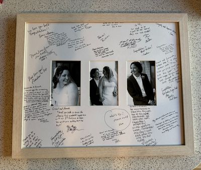 wedding guest book photo matt recut (everyone signed the back) and framed finally, 18 years later, lol.
